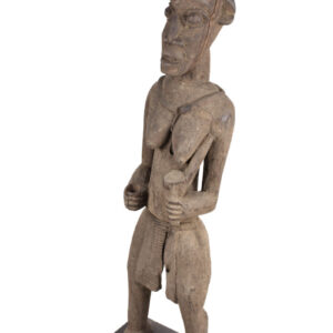 Memorial Figure - Wood - Bangwa - CameroonEnormous Bangwa figure, total length: 158 cm! Good condition with traces of tribal use.Memorial figures were carved of titled royal wives or princesses, and are often refered to as Bangwa Queens. Their royal status was defined by their collars, necklaces, loin strings and anklets and are usually depicted dancing and singing as at a funeral for a king. They were also honored as priestesses of the earth cult and were displayed lining the verandas of royal residences. Enormous Bangwa figure, total length: 158 cm! Good condition with traces of tribal use.